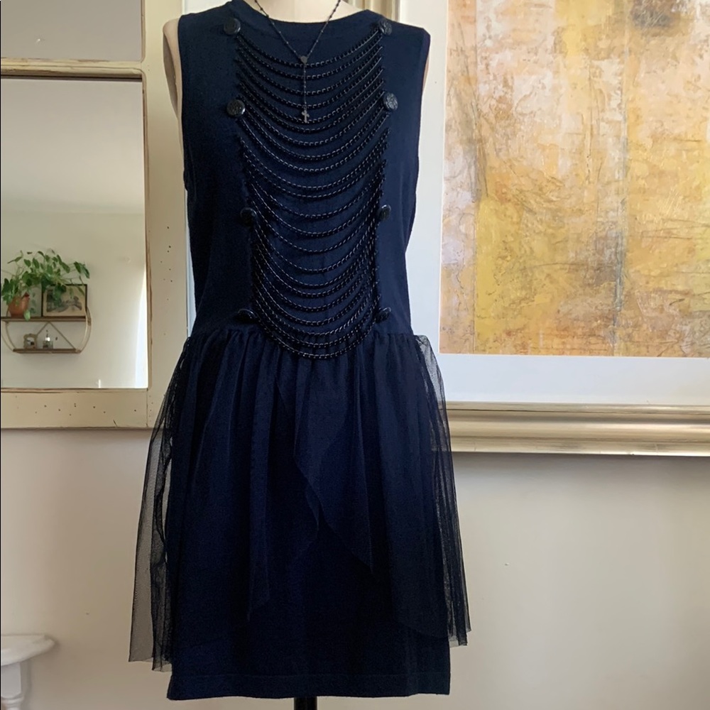 Elegant Black Sleeveless Dress with Chain Detail